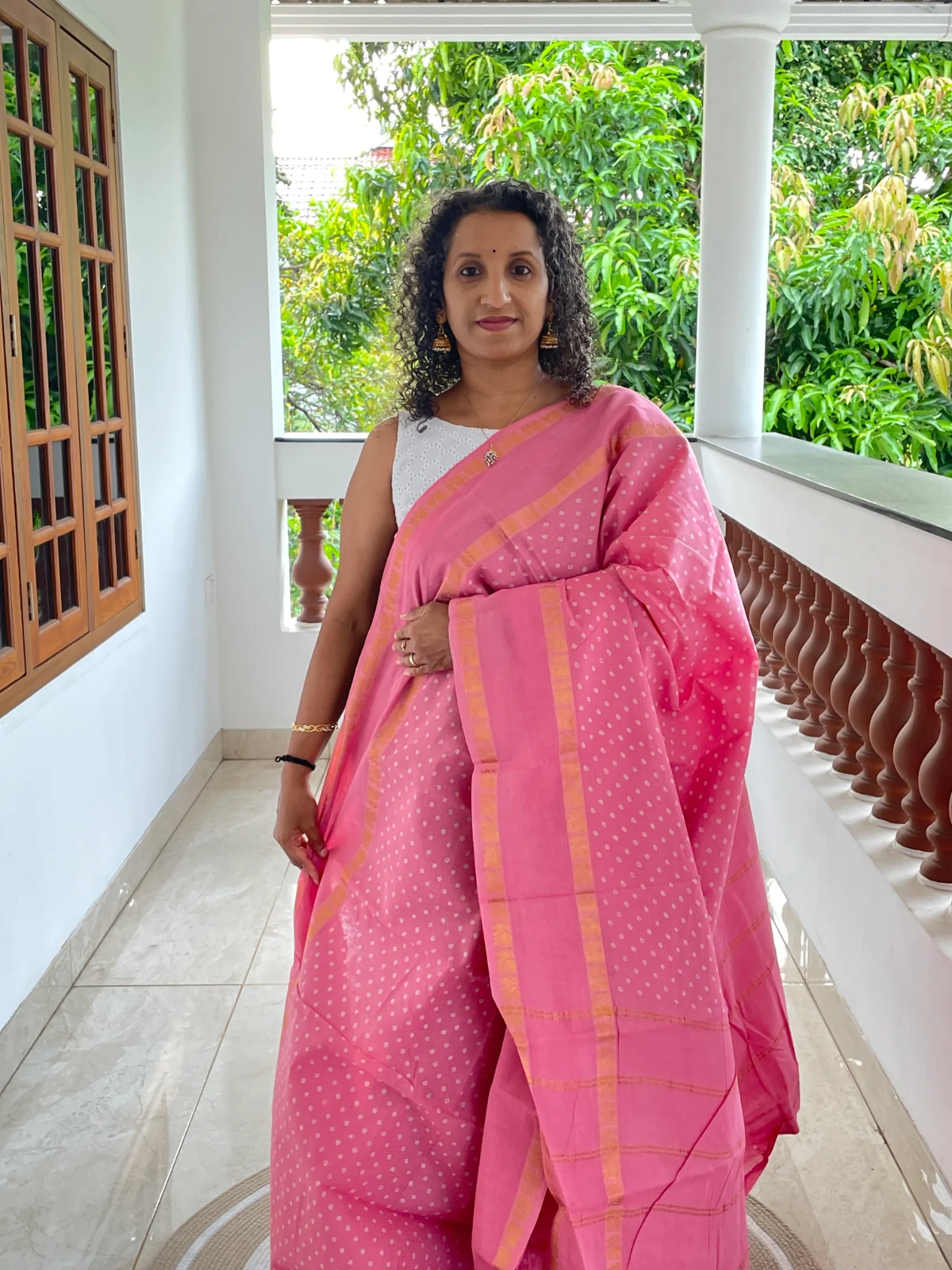 Rose Pink Wax Printed Madurai Sungudi Cotton Saree with Peacock Gap Border